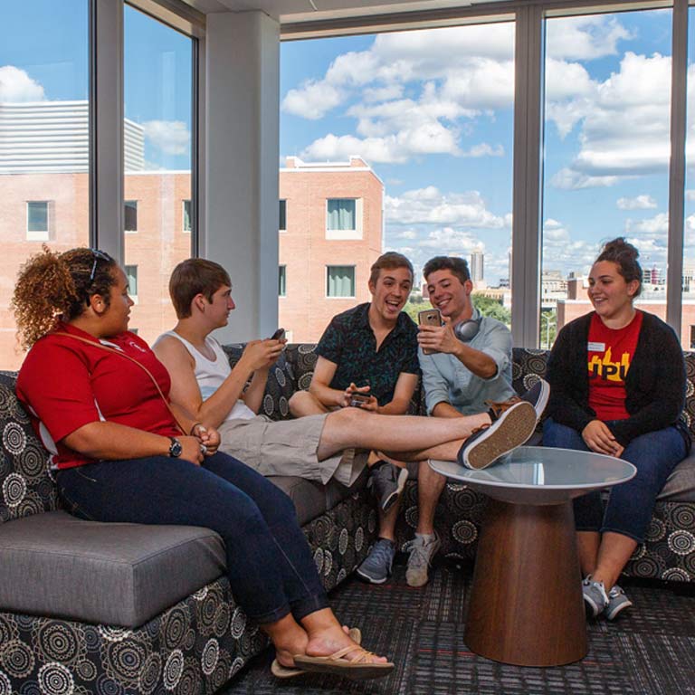 First-year students socialize in their new housing.