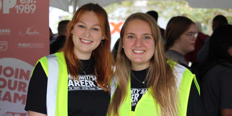 Two students smiling for a photo at Community Safety Career Day